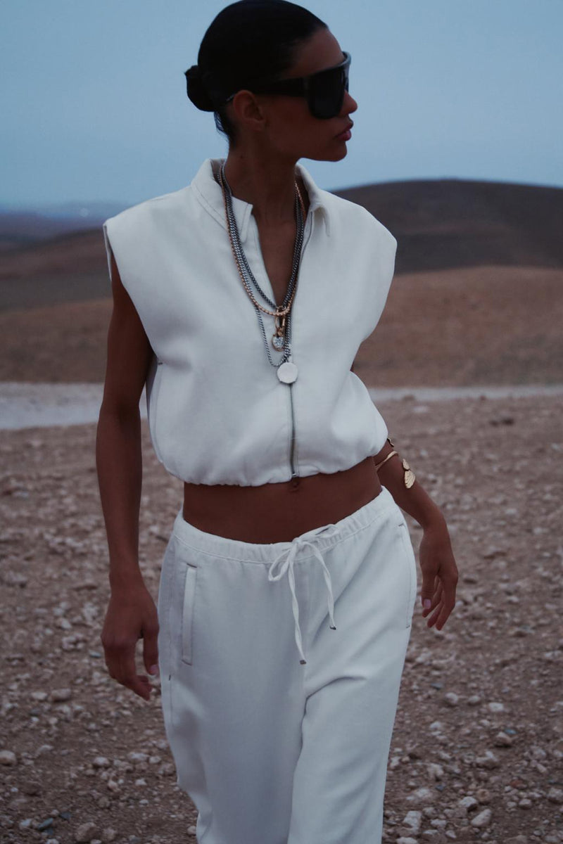 ELASTİK ETEKLİ ÜSTTEN DİKİŞLİ YELEK