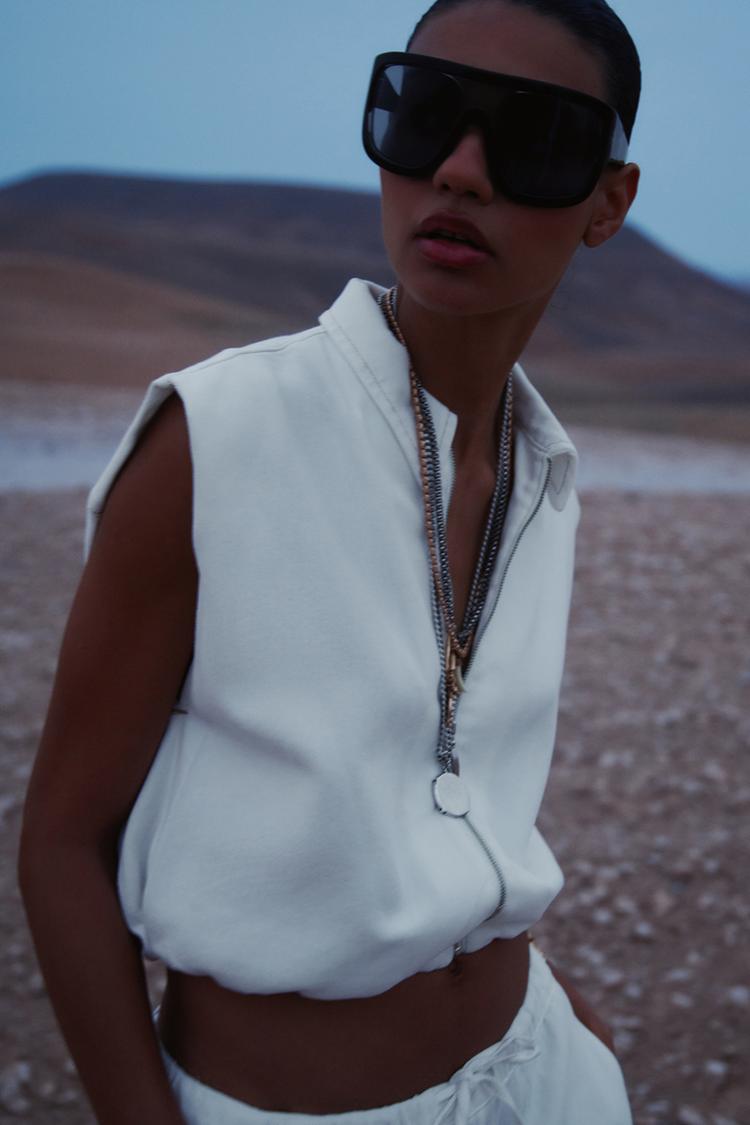 ELASTİK ETEKLİ ÜSTTEN DİKİŞLİ YELEK