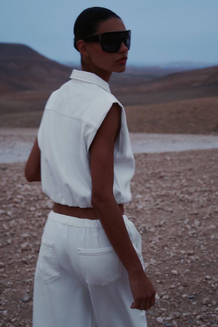 ELASTİK ETEKLİ ÜSTTEN DİKİŞLİ YELEK