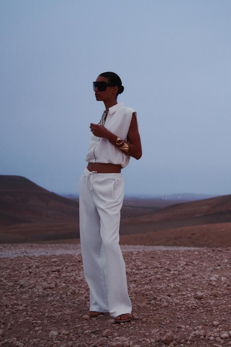 ELASTİK ETEKLİ ÜSTTEN DİKİŞLİ YELEK